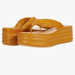 COPY - Slip into instant style in the Free People™ Haven Thong Flatform. Size 3…